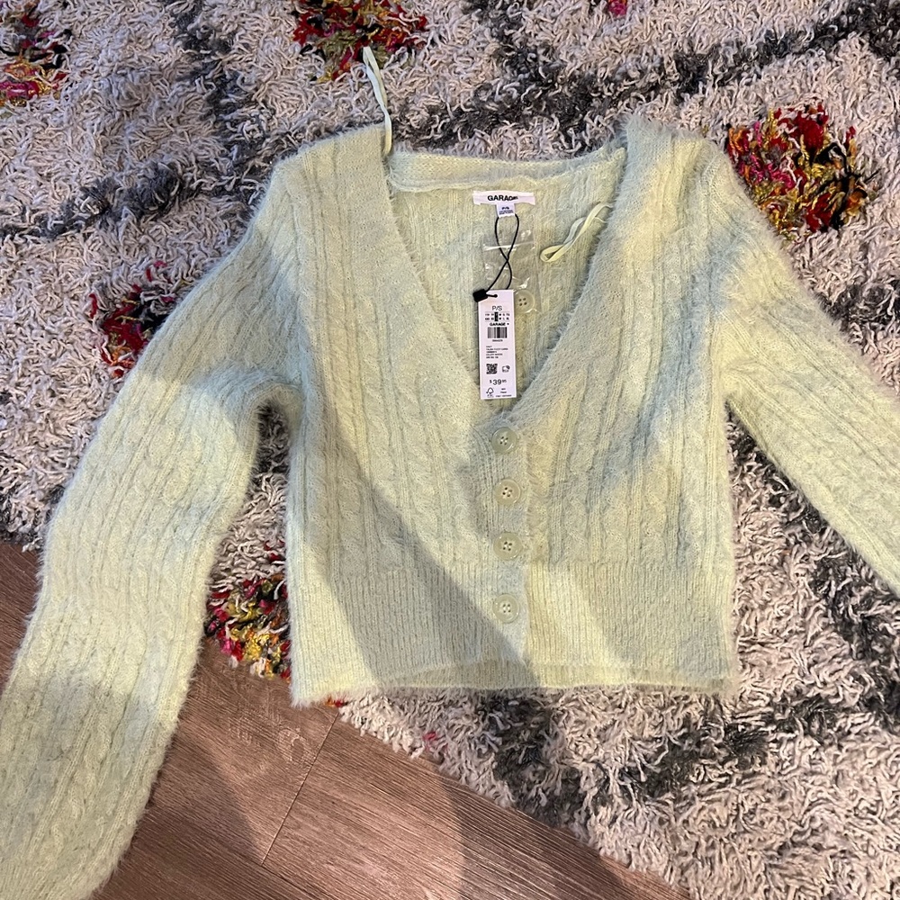 green fuzzy sweater never worn